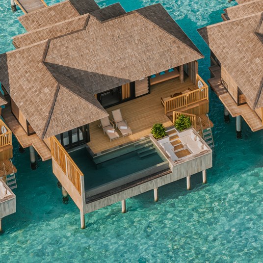 Sunset Horizon Water Villa With Pool Aerial View